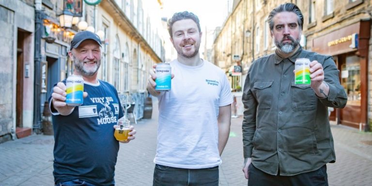 Men posing with beer