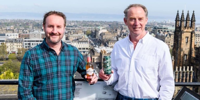 men posing with beer