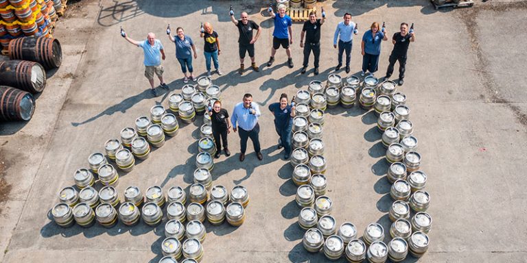 Harviestoun staff with number 40 made from beer barrels