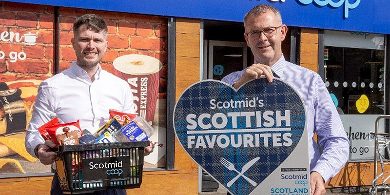 Two men outside a Scotmid store