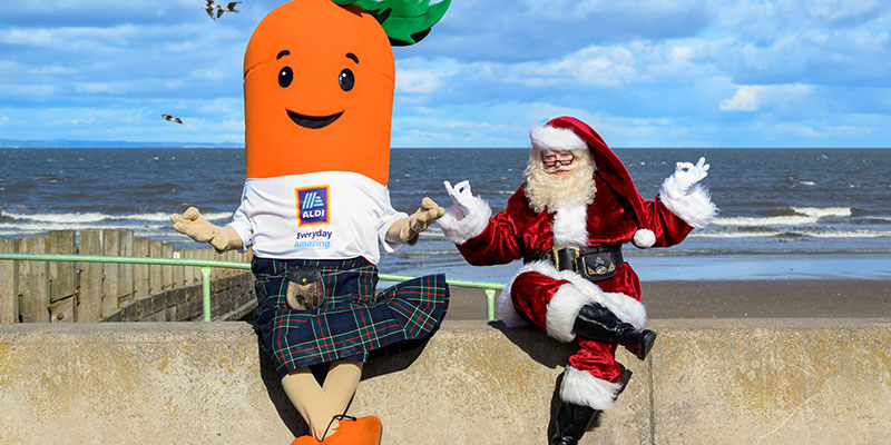 Giant carrot and Father Christmas meditating