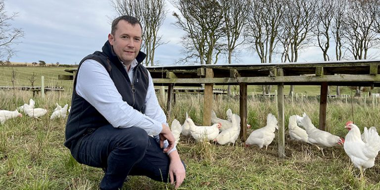 Man with chickens