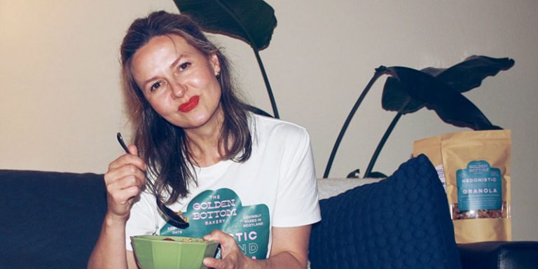 Woman eating granola