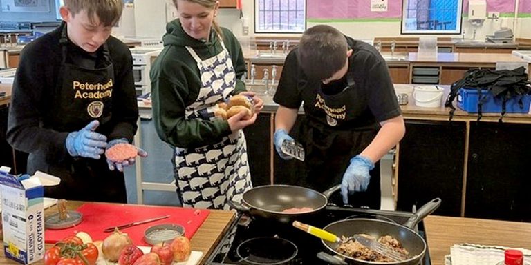 Schoolkids cooking